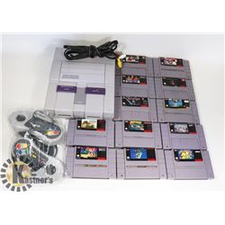 SUPER NINTENDO WITH TWO CONTROLLER  AND 12 GAMES