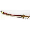 Image 1 : CURVED SWORD IN A RED VELVET SCABBARD BRONZE