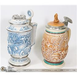 BOX WITH TWO LARGE COLLECTIBLE STEINS -