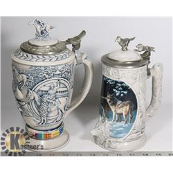 BOX WITH TWO LARGE COLLECTIBLE STEINS -