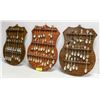 Image 1 : LOT OF COLLECTOR SPOONS ON 3 WOODEN WALL MOUNTS.