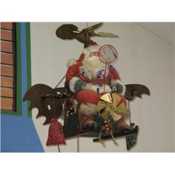 Santa Claus on a hillbilly helicopter