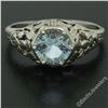 Image 2 : Antique Art Deco 18kt White Gold Round Aquamarine Solitaire Floral Filigree Ring