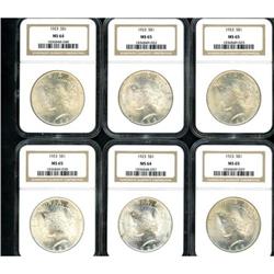 Lot of Twelve Peace Dollars NGC