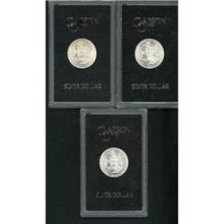 Lot of Five 1882-CC GSA Morgan Dollars