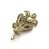 Image 1 : VINTAGE SPAIN MARKED GOLD TONED FLOWER