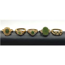 5-GOLD TONED FASHION RINGS WITH GREEN STONE