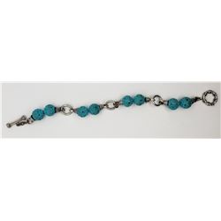 8 INCH STERLING CARVED TURQUOISE BRACELET