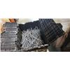 Image 2 : 2 totes of pegboard hooks,flagpoles and tire chains