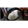 Image 1 : 2 beveled oval wall mirrors