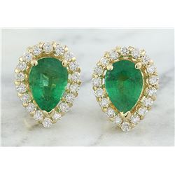 1.45 CTW Emerald 18K yellow Gold Diamond Earrings