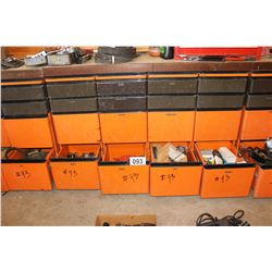 7 DRAWERS OF MISC AT BOTTOM OF ORANGE COUNTER