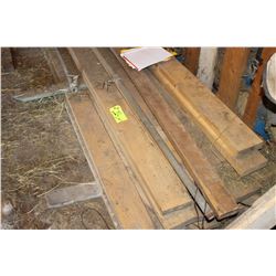 PILE OF 2 X 6'S WEST OF DOOR ENTRANCE