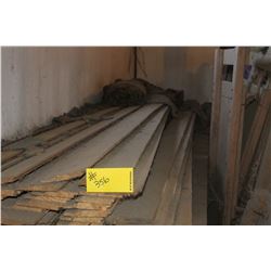 BIG PILE OF DROP SIDING & 1 X 6'S LOCATED IN BARN