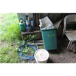 GREEN TUB, BLUE EXTENSION CORD, T-BARS, WOOD POSTS, CONTAINER OF FENCE STAPLES