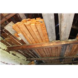 WOOD IN RAFTERS OF OLD GARAGE TO THE WEST