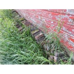 PILE OF SOLID BRICK (NORTH SIDE OF GARAGE)