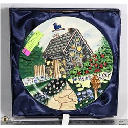 8" COLOURFUL PLATE OF BUILDING WITH ROOSTER