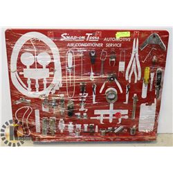 BOARD OF ASSORTED SNAP ON TOOLS
