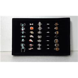9)  LOT OF 35 FASHION RINGS IN DISPLAY CASE