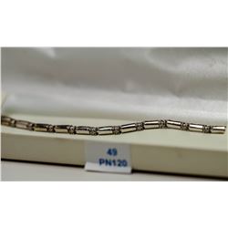 49) 10KT WHITE GOLD DIAMOND BRACELET.