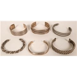 Six Twisted Silver Bracelets (121115)