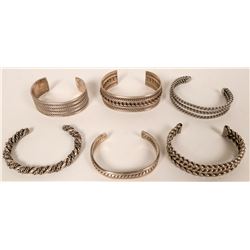 Six Twisted Silver Bracelets  (121115)