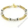 Image 1 : 14kt Yellow Gold Twisted Tube and 14kt White Gold Rolo Link Chain Toggle Bracele