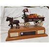 Image 1 : PARKSIDE LUCKY DOLLAR TROPHY, CAST IRON WAGON