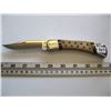 Image 1 : BUCK ANVIL 10 2005 KNIFE (STARS ON THE HANDLE)