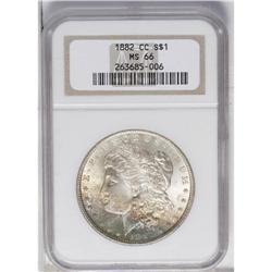 1882-CC S$1 MS66 NGC. The lower left obverse has a ban 