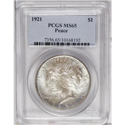 1921 S$1 MS65 PCGS. Splotchy, light gray-gold and russ 