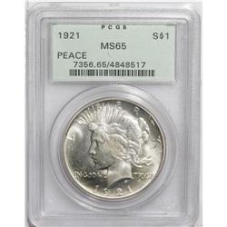 1921 S$1 MS65 PCGS. Delicate gold toning visits this t 