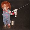 Image 1 : CULT OF CHUCKY ONE ARM PRODUCTION MADE STAND IN DOLL HOLDING STUNT DRILL