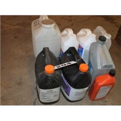 8 PARTIAL JUGS OF OILS & CHEMICALS