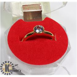 #92-TOPAZ RING SIZE 7