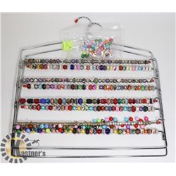 LOTS OF ASSORTED CHARM BRACELET BEADS