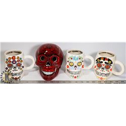 BOX OF CERAMIC SKULLS