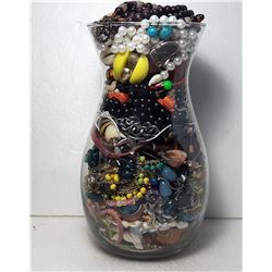 20)  LARGE GLASS VASE CONTAINING JEWELRY