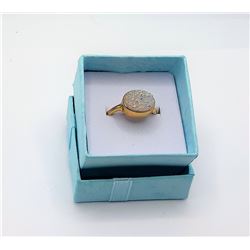 7)  GOLD TONE AND WHITE OVAL DRUZY RING SET