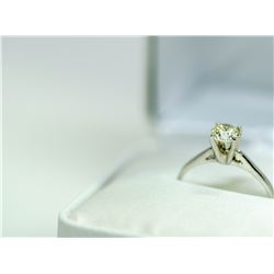87) A PLATINUM DIAMOND SOLITAIRE RING. SIZE 7