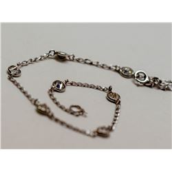 48) 10KT WHITE GOLD DIAMOND BRACELET.