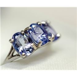71) A 10KT WHITE GOLD TANZANITE RING. SIZE 7
