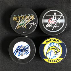 AUTOGRAPHED HOCKEY PUCK LOT (LEHTONEN, MASON, PARROS...)