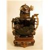 Image 2 : A CHINESE CARVED DARK GREEN GLASS BOTTL