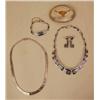 Image 1 : A TIFFANY AND CO. STERLING SILVER FEATH