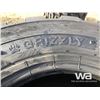 Image 2 : (UNUSED) (4) GRIZZLY SKID STEER 12-16.5 TIRES