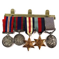 Group of 5 WWII Medals including the Prestigious Distinguished Flying Medal (FS W. H. Magill). We ar