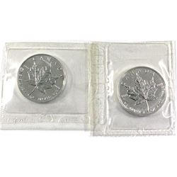 2x 1oz  Silver Maple leaf's still sealed in Original Mint Pliofilm.  Lot includes rare 1996 and 1998