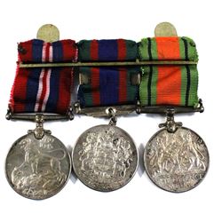 Set of 3 WWII Medals: Set includes the 1939-45 Defence Medal, Volunteer Service Medal, & the 1939-19